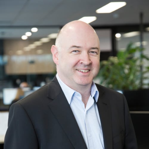A portrait of Michael Coyle, Director for Data Management at QMetrix.