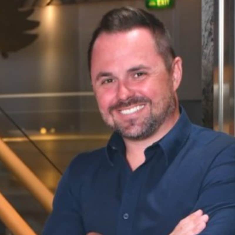 Headshot of Reed Gusmus, Chief Marketing Officer.