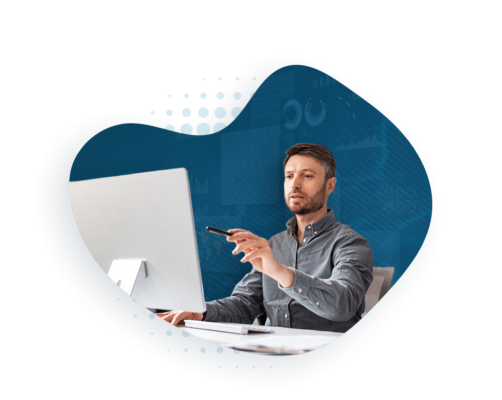 Man pointing at a computer screen with BI analytics graphic.