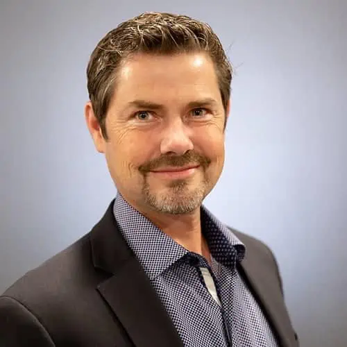 Portrait of Christopher Dwight, VP of Strategic MDM Programs.